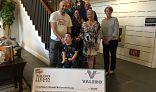 Check Presented to Families and Staff of the Long Beach House 