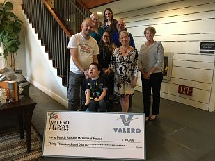 Check Presented to Families and Staff of the Long Beach House 