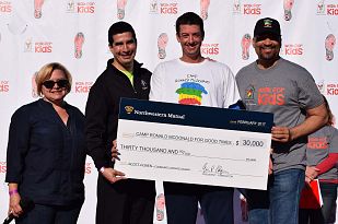 Camp receiving Northwestern Mutual Check