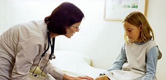 Doctor Talking to a Young Girl